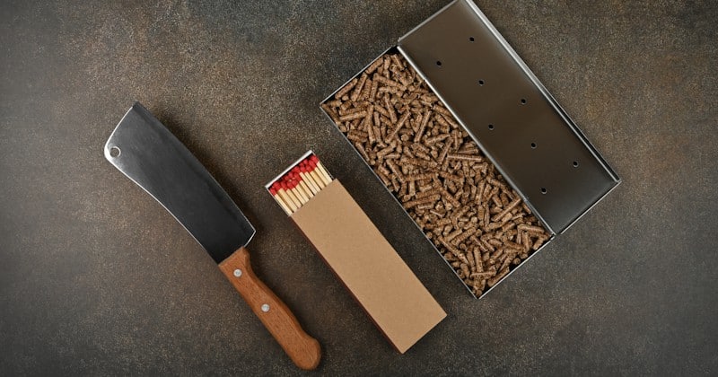 wood pellets in smoker box matches and knife
